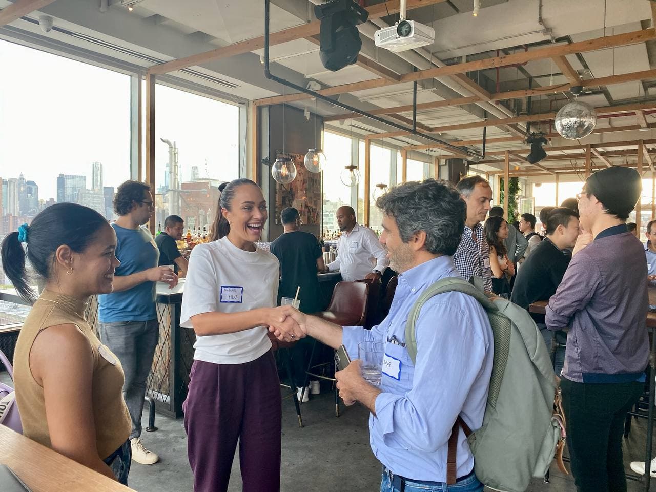 Handshakes at a Startup Valley night in New York